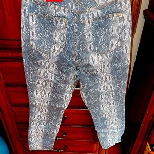 Jennifer Lopez snake print jeans